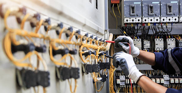 Professional Electrician technician working in Hooks, TX